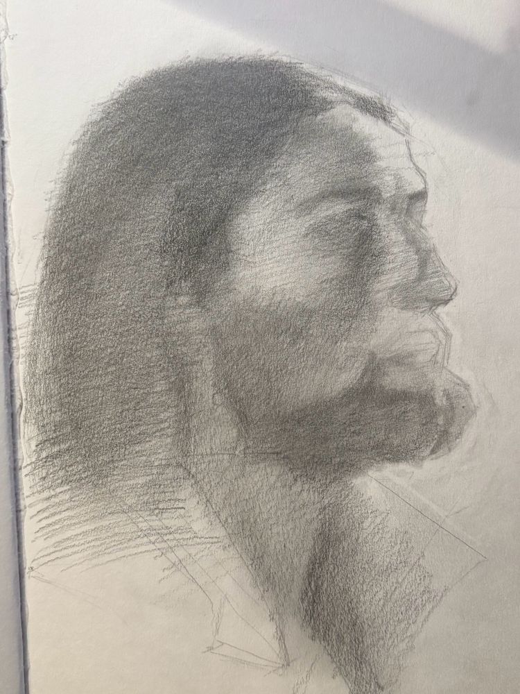 Graphite portrait drawing of a man with a beard and long hair, first stage
