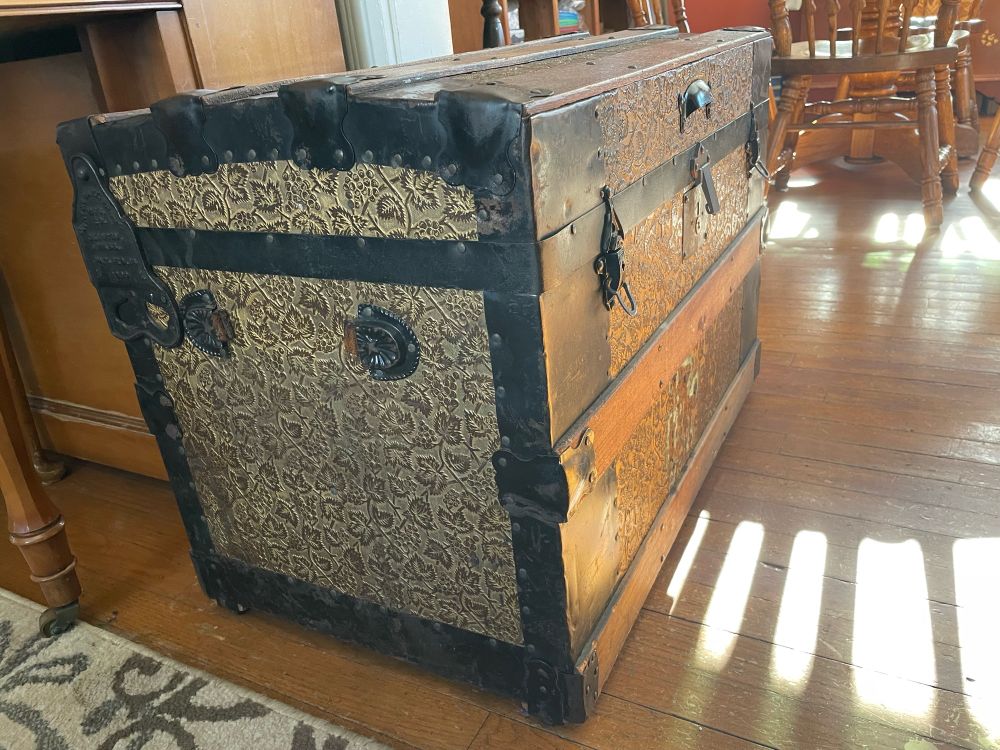 Old chest with missing handle. 