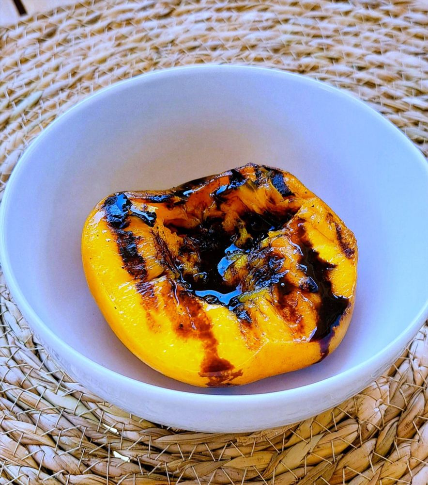 How ancient fire pits, summer fruit, and a little caramelization came together on the grill.
