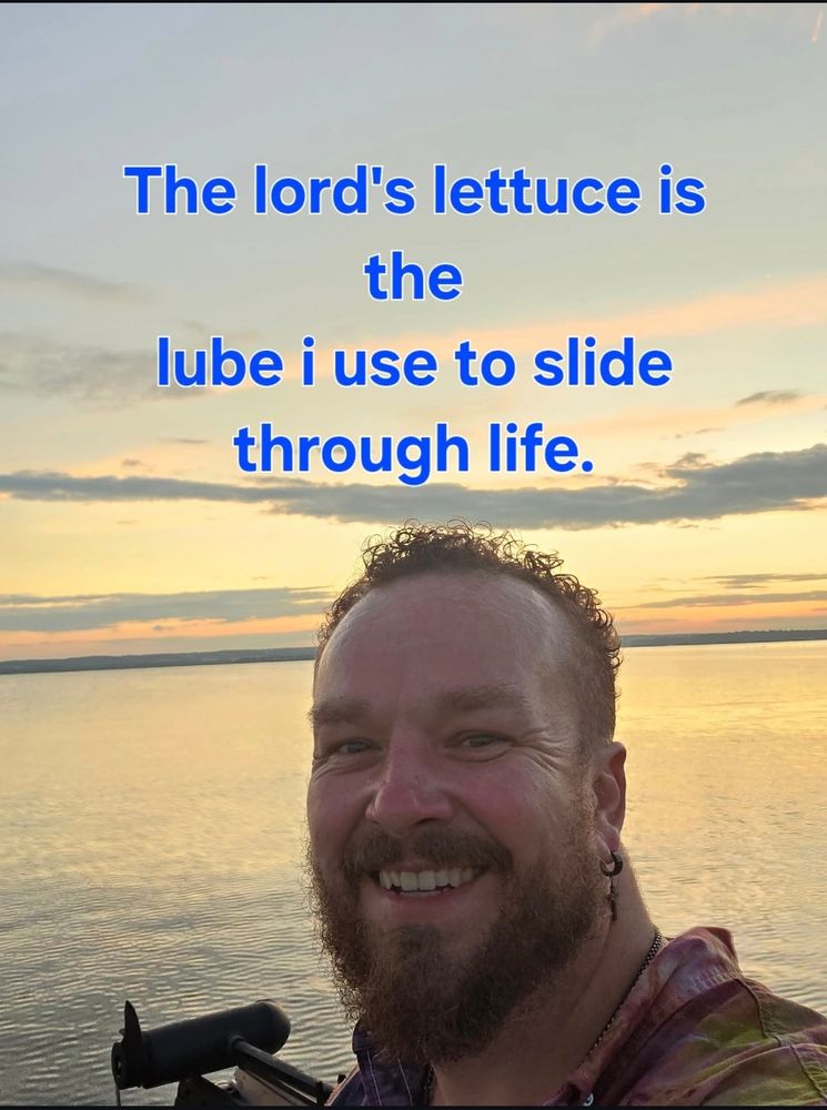 Picture of a very happy person overlooking a sunset with text above their head that reads: "The lord's lettuce is the lube i use to slide through life"