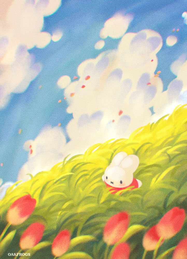 artwork of the character miffy in long windswept grass, on a sunny hillside. the illustration is framed with pink tulips in the foreground and rabbit shaped clouds in the background against a pale blue sky. pink tulip petals flow in the wind. 