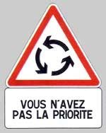 French road traffic sign for a roundabout warning those entering the roundabout that they don’t have right of way. VOUS N'AVEZ PAS LA PRIORITE