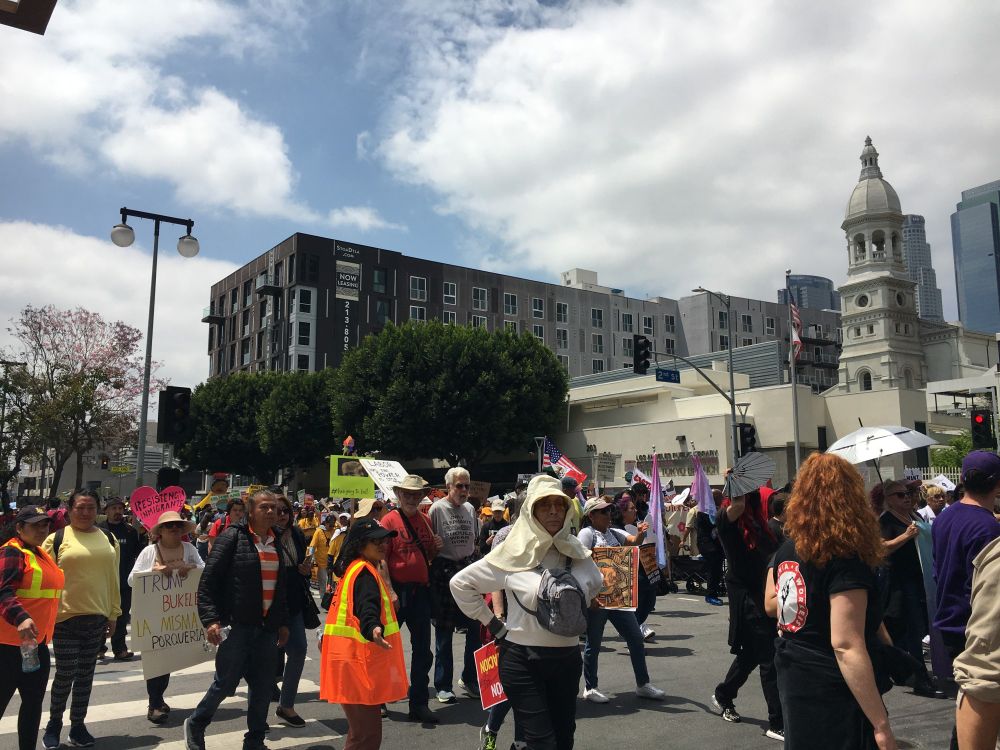 In the middle of a large group of people marching in Los Angeles