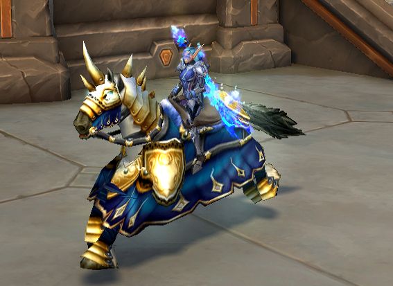 a screenshot of a blood elf paladin, riding an alliance human paladin horse, wearing blue armor, wielding a blue fire sword