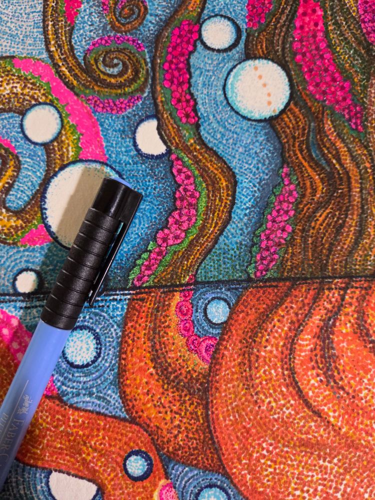 Artwork made of many dots. Octopus tentacles and bubbles in blues and oranges.