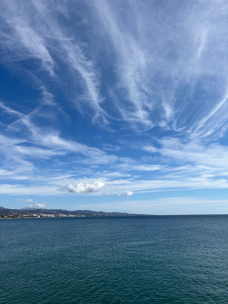 the sky, the sea, and the coastline of southern Spain