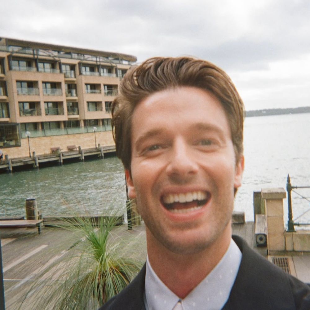 patrick schwarzenegger smiling really big