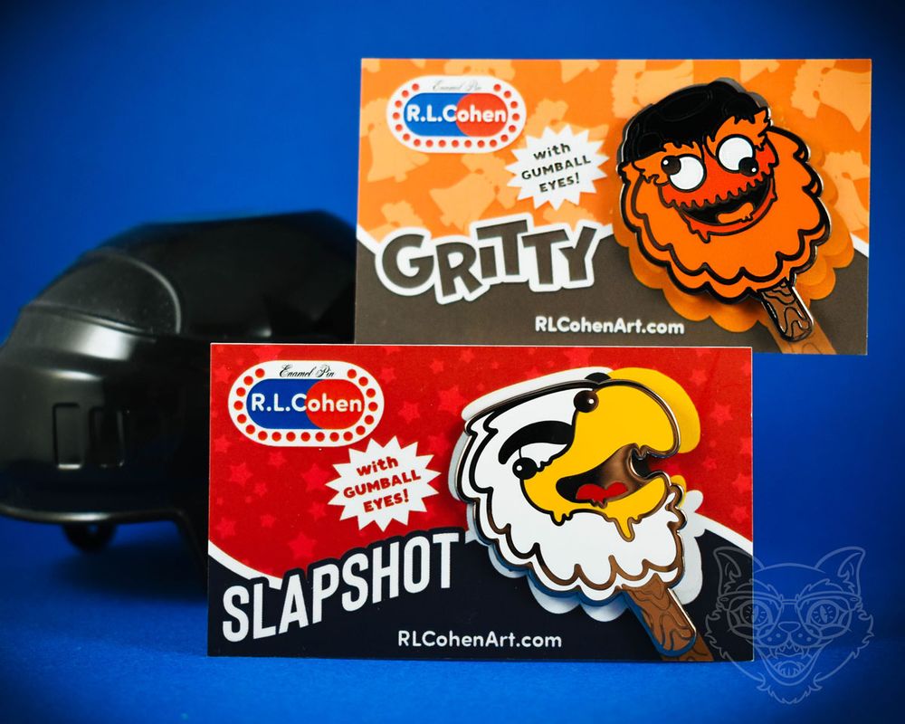 Enamel pins of the mascots Gritty and Slapshot as silly novelty popsicles