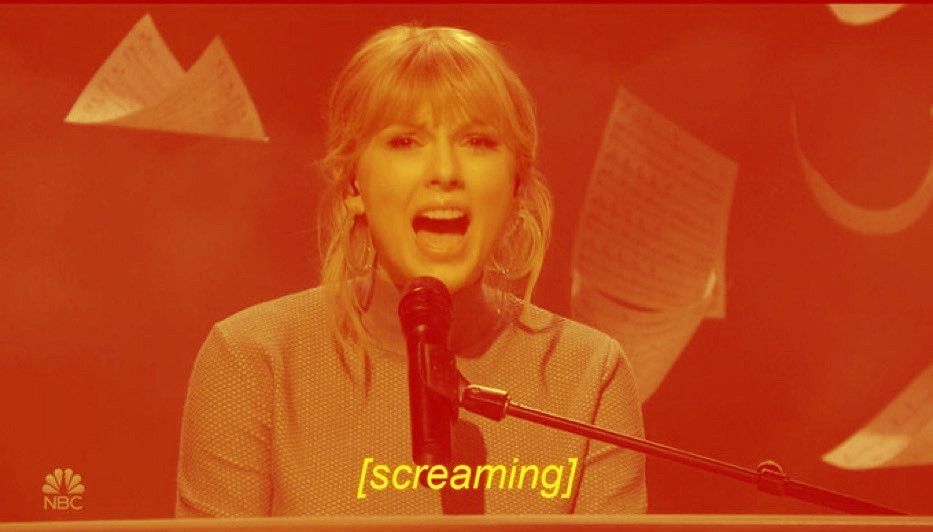 Taylor Swift screaming with an orange hue