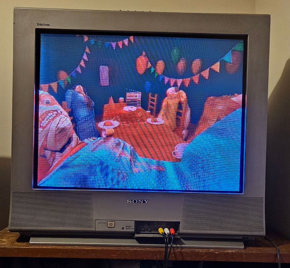 A picture of mouthwashing in a crt. The scene is Jimmy carrying Curly in front of the rest of the characters, they are dead and sitting around the table