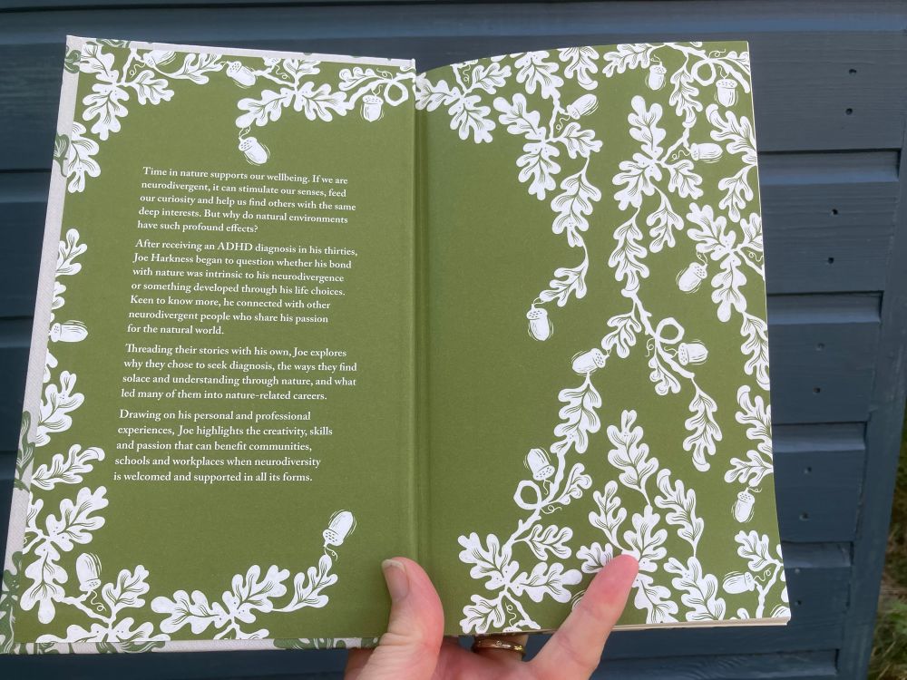 Inner covers in a lovely, serene green colour, illustrated with acorns & oak leaves in white 
