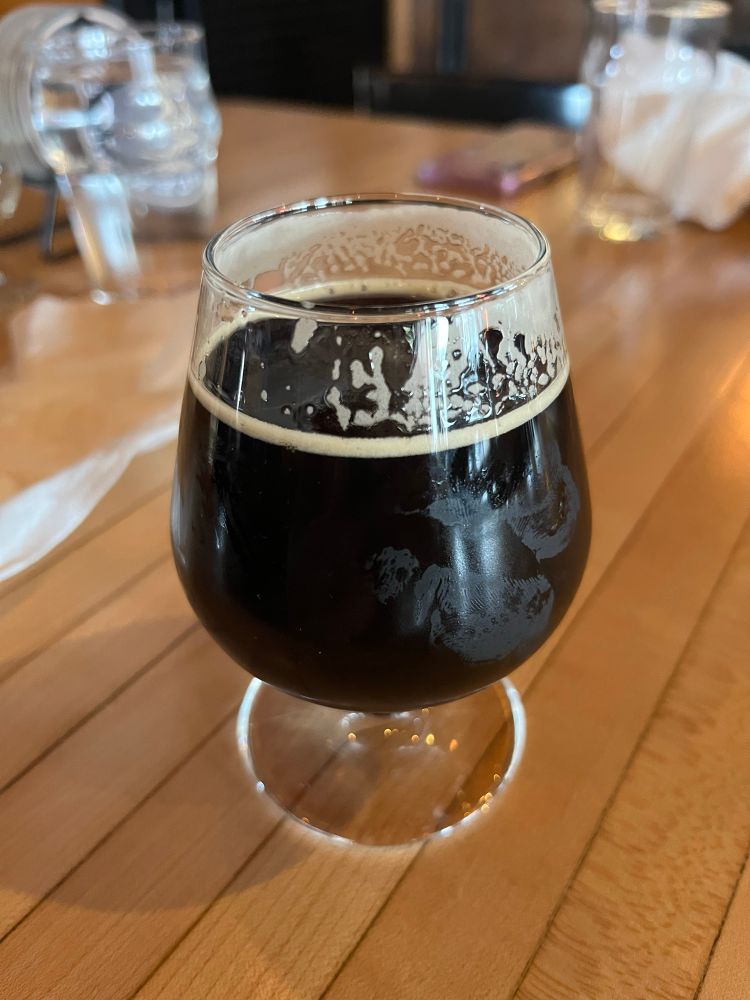 A glass of Monnik’s Odinnatsat Russian imperial stout.