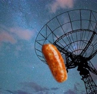 A large radar dish looks on at nothing in particular.
Meanwhile, my banger (sausage) slips underneath at speed