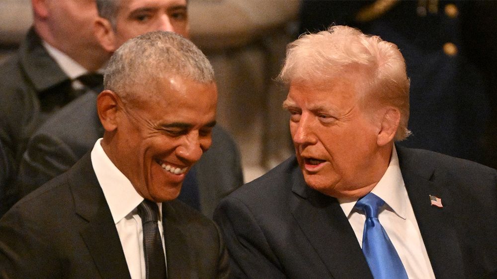 Foreground: two men who have discovered common ground. Background: All of us