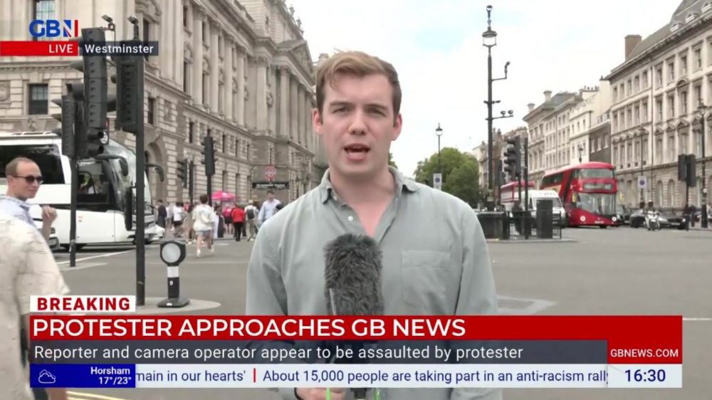 Protester approaches GB News at anti-racism march