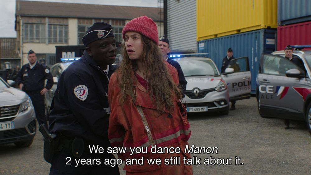 Screenshot from the Prime show Étoile featuring Lou de Laâge as prima ballerina Cheyenne Toussaint, being arrested after threatening her fellow eco-activists