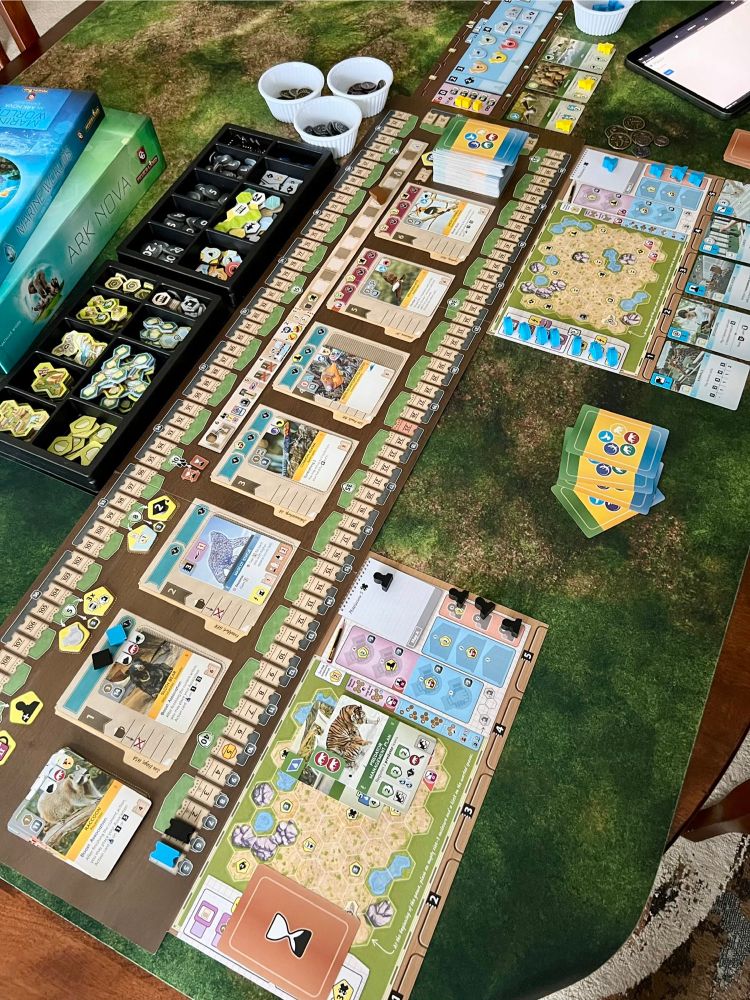 Ark Nova board game set up for a solo game with the Marine Worlds expansion against the ARNO solo bot