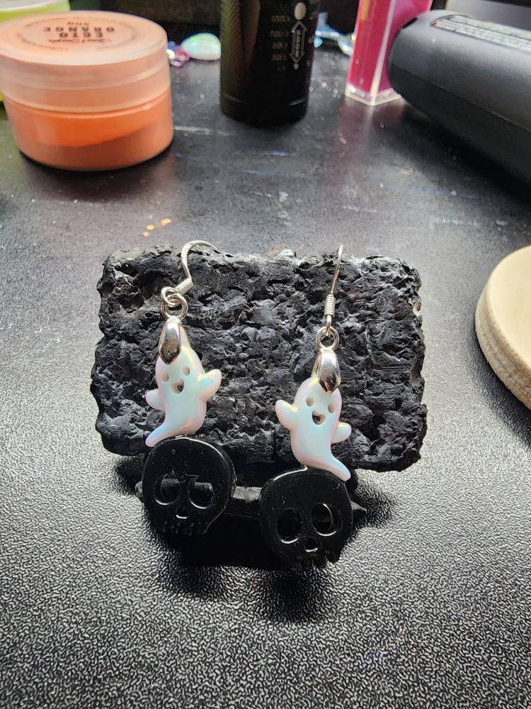 Rainbow aura ghosties on black skulls hanging from sterling silver earrings!