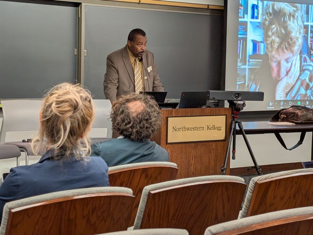 Aldon Morris speaking and Donnatella della Porta on the virtual screen
 