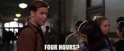 A man and a woman talking in a crowded hallway at Harvard Law School, from the movie “Legally Blonde.”

The woman indignantly says “FOUR HOURS?”