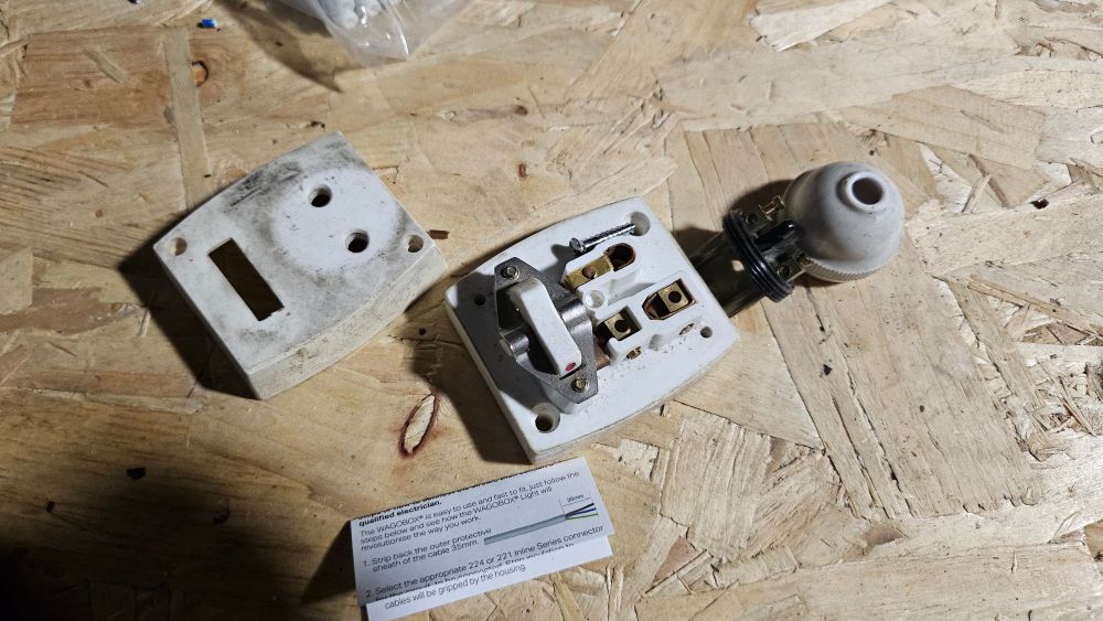 70s(?) style light switch in pieces. 