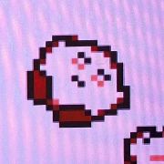 close up of a sleeping kirby on kirby nes
