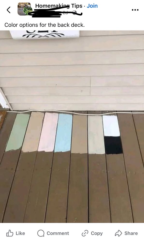 A photo of a deck with each slab partially painted. From left to right: green, tan, pink, blue, light brown, cream, half white half black