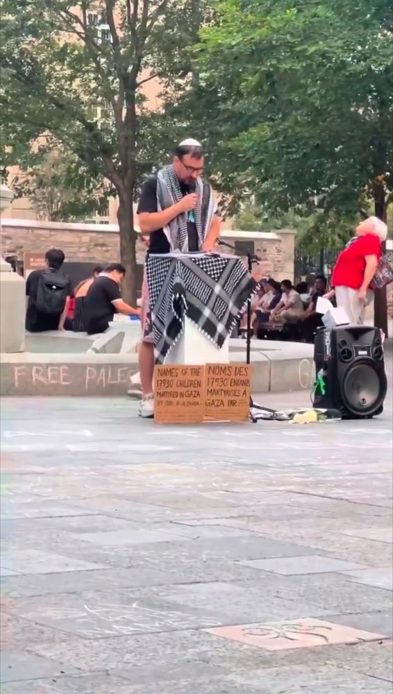 A man in Montreal, reading the names of children killed in Palestine,17930 children killed by Israel 