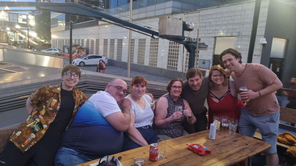 A photo in London, England with cast and crew of The Secret of St Kilda. 
from left to right, Production Assistant - Louis, Narrator - Alasdair, Mama Laveau - Marguerite, Elder Eli - Sarah, Elder Findlay - Rhys, Writer - Naomi, Lockie - Alan. 
