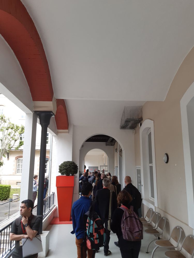 Academics queuing for a badge at the entrance to the NDH6 conference in Aix en Provence