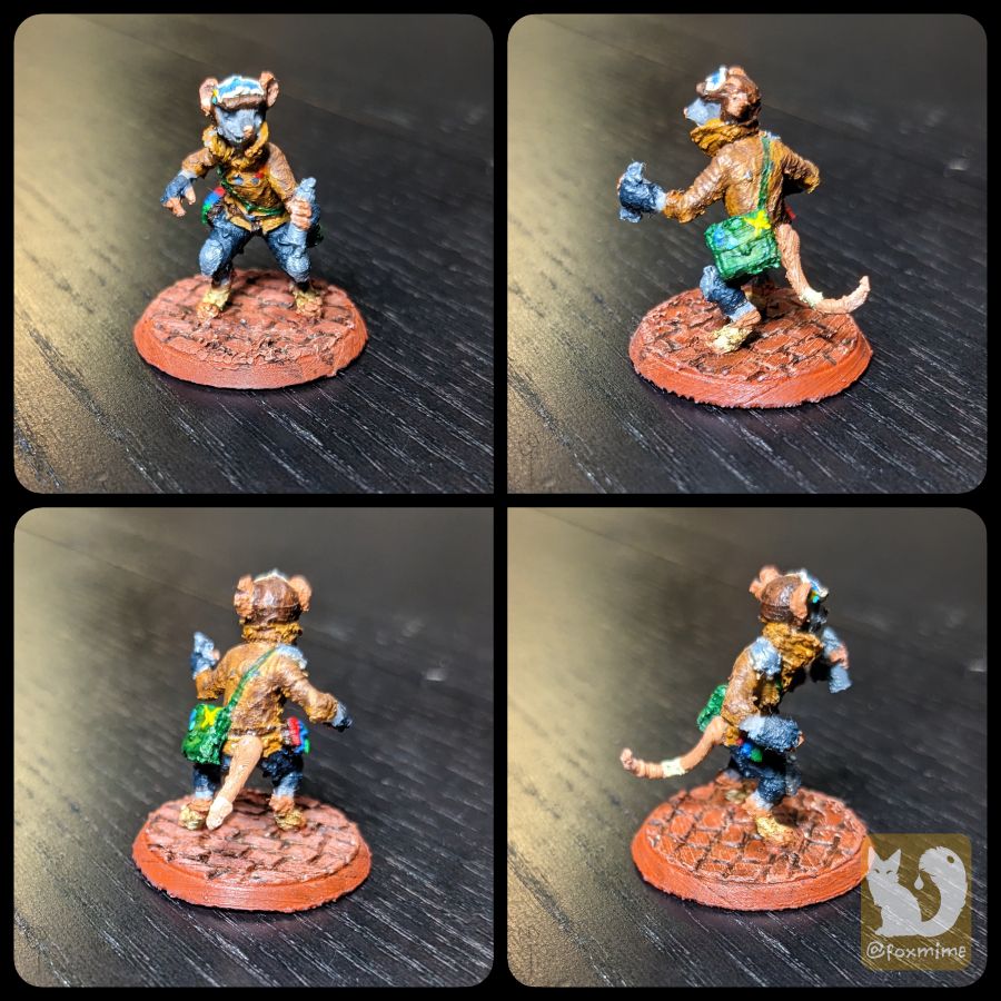 4 photos of a 3d printed painted miniature, each photo from a different turn around angle: front, left side, back, right side. The striations and small imperfections of the printed plastic are visible. The figure is of a bipedal rat with grey fur wearing a short oiled suede leather jacket and dark bluish-grey pants that stop just below the knee. He wears a matching leather hat with his dark pink rat ears sticking out the top. A pair of white trimmed goggles are perched on the hat brim. There are small bits of metal armor on the knees and one shoulder. He has a multicolored set of vials attached to his belt, an olive green satchel slung across his body, and he's wielding a silver spray paint can.