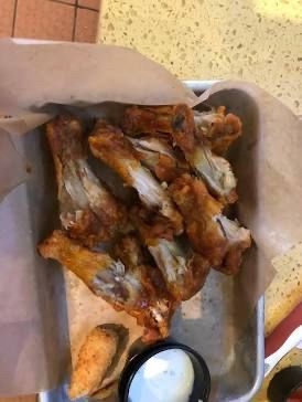 Half eaten chicken wings 