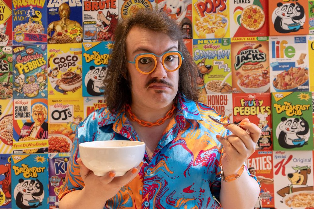 Stupes with a bowl of cereal and frankly ridiculous glasses.