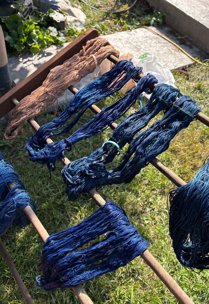 Yarns dyed mostly blue