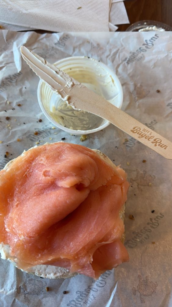 Jeff’s bagel run order of Asiago everything bagel covered in jalapeño spread and lox 