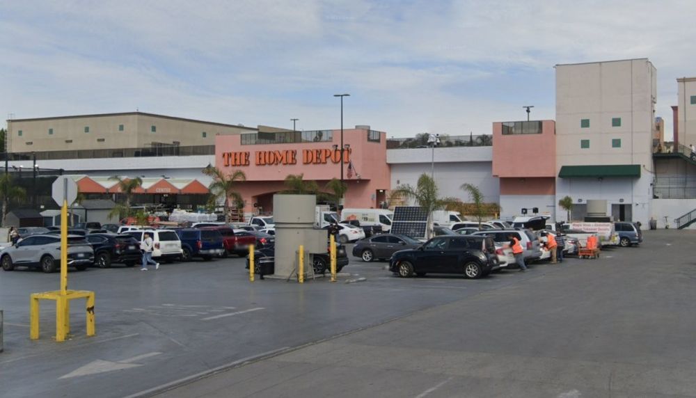 According to video from Fox News, agents burst from the rear of a yellow moving truck and then ran toward a group of people amassed near a sidewalk food stand.