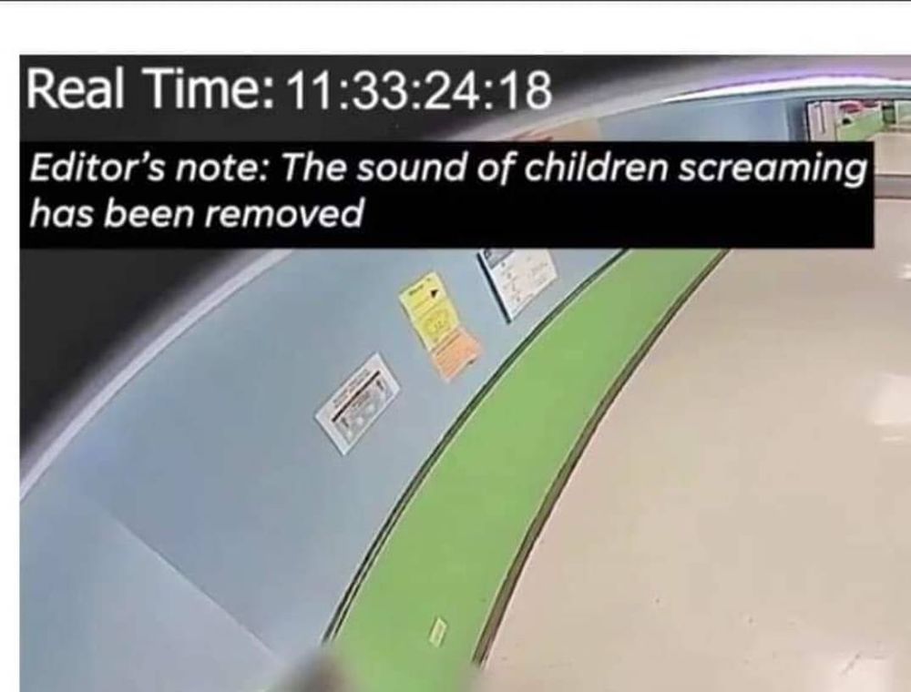 frame of the top left corner of robb elementary security camera recording during the uvalde shooting when police waited for over an hour down the hall while children and teachers died. time stamped 11:33:24:18 caption reads, 
