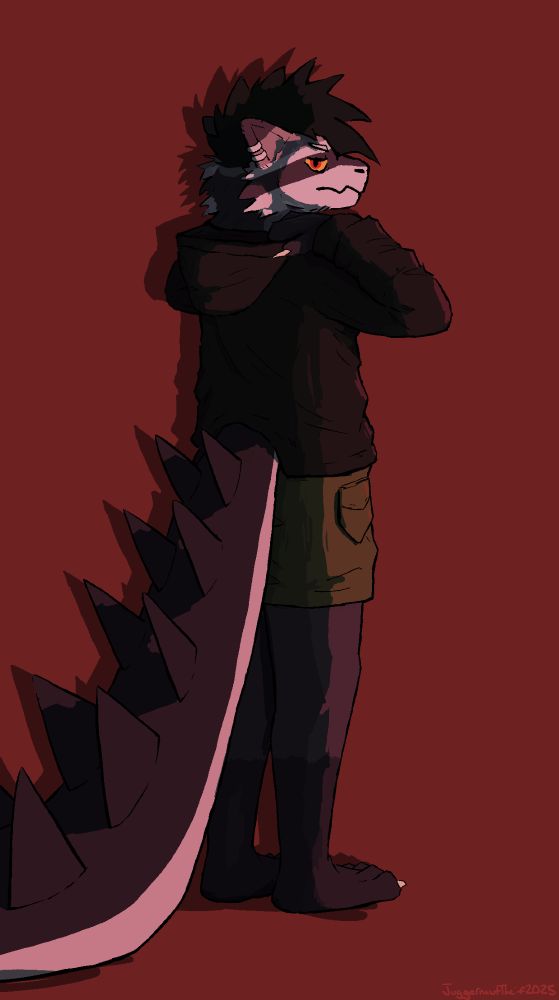 Krostata's character is standing with their hands placed on the hood of their hoodie, the hood itself is currently down. They are wearing a black hoodie and green shorts. They have light gray fur, dark gray fur, and gray fur. They also have a tail with 2 sets of spikes going down the top of the tail to the tip. Pointy black hair, similar looking to a mohawk.