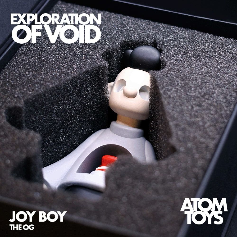 Alt text: Joy Boy, the OG designer art toy, carefully placed inside its custom-designed box, showcasing the thoughtful packaging and presentation of this limited-edition collectible.