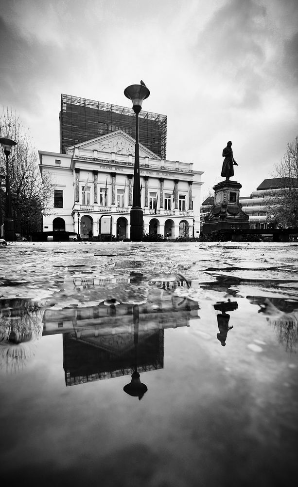 The opera in Liège on a rainy day. Puddle shot in black and white with a nice reflection. 