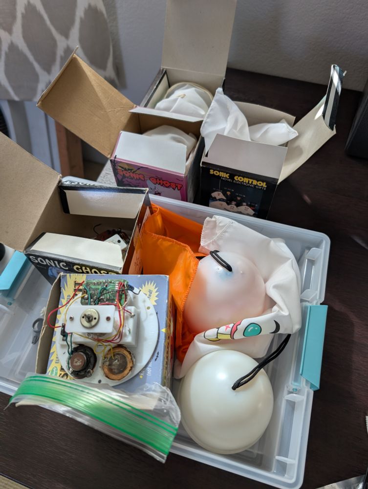 Approximately seven "sonic ghost" vintage novelties, some of them in boxes, some of them partially disassembled
