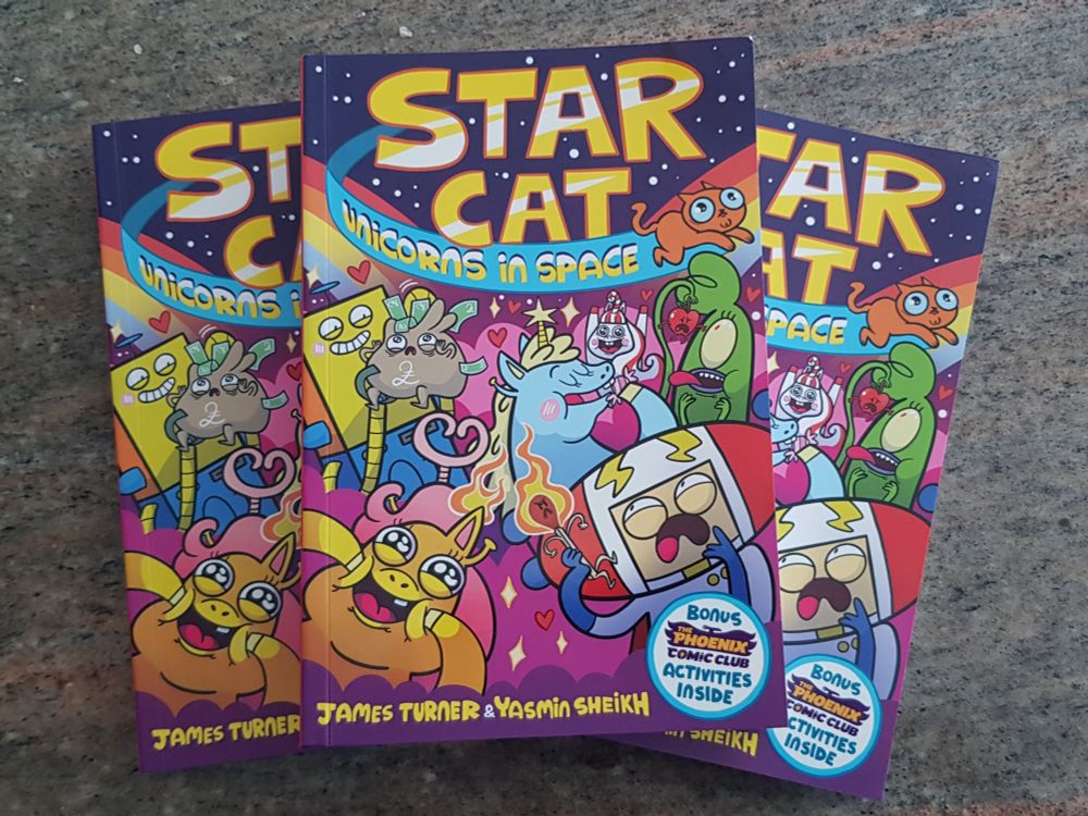 Three copies of the work of heartbreaking genius that is 'Star Cat: Unicorns in Space' (a comic book wot I wrote)