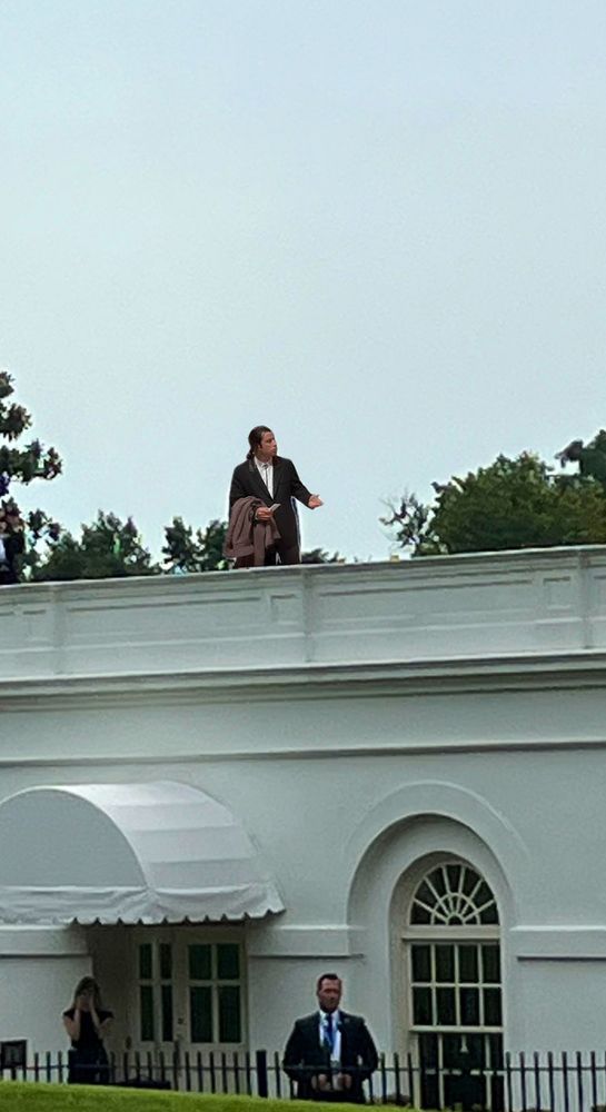 same image but it's lost travolta on the roof