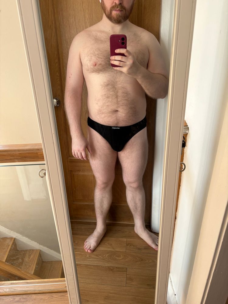 Me in a standalone mirror in just a pair of black underpants