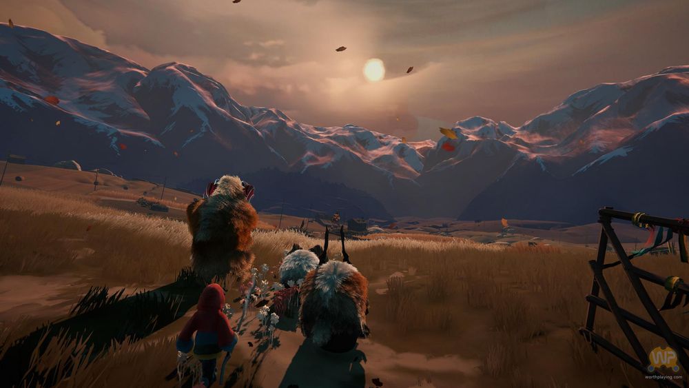 The sun is setting in the distance, over the mountains. A girl and three Calicorn are in the foreground, watching the sunset.