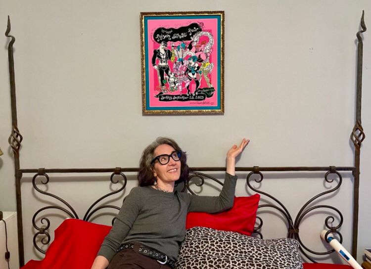 Me on bed below the Folsom street Fair poster I drew. 