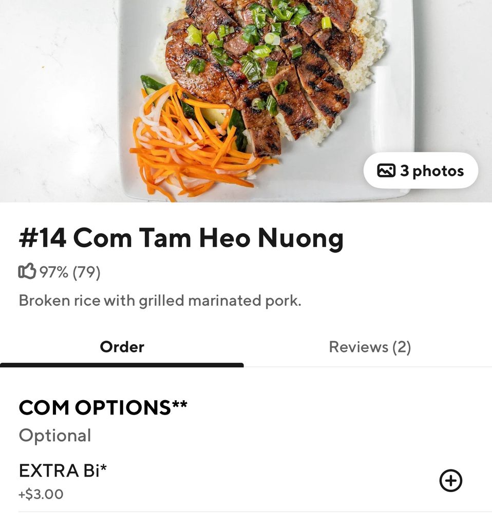 A doordash screenshot showing Com Tam Heo Nuong, called Broken Rice with Grilled Marinated Pork, with the option “Extra Bi” selected 