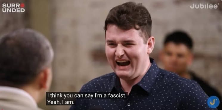 Screen shot from Jubilee Surrounded With shit eating grin guy saying “I think you can say I’m a fascist. Yeah, I am.”