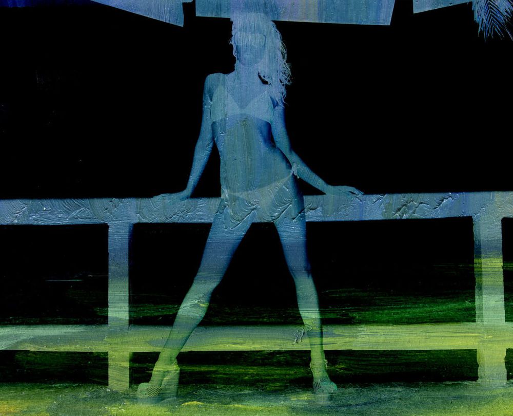negative image of model on the boardwalk