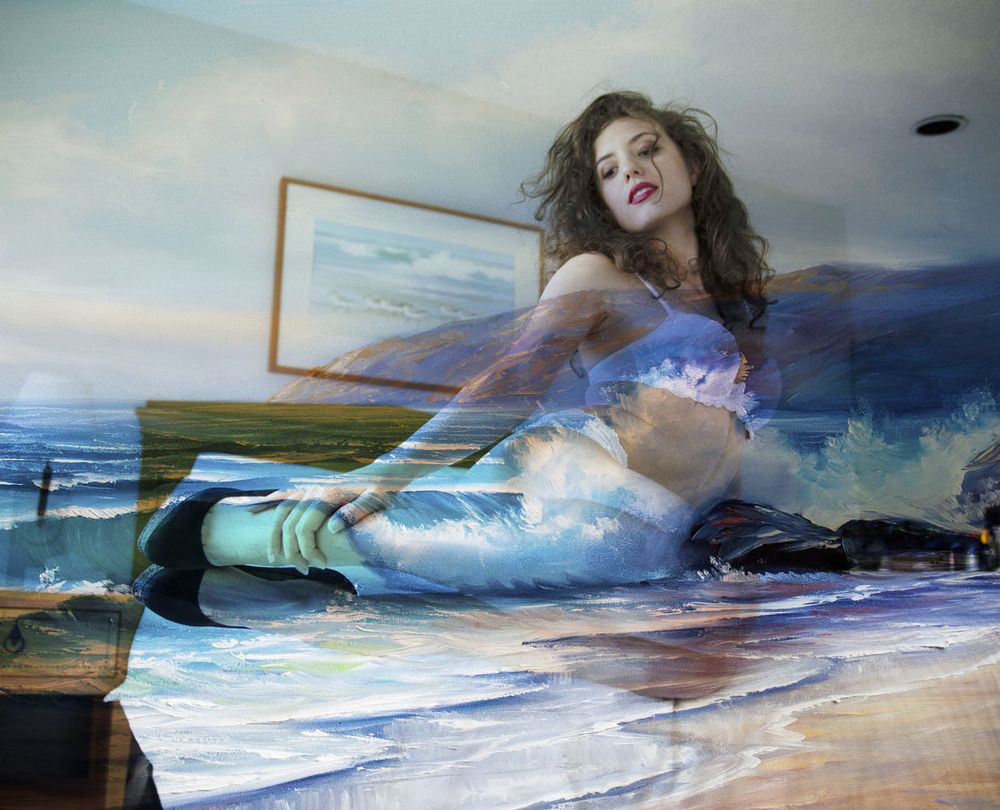 image of a model with a beach scene painted over her